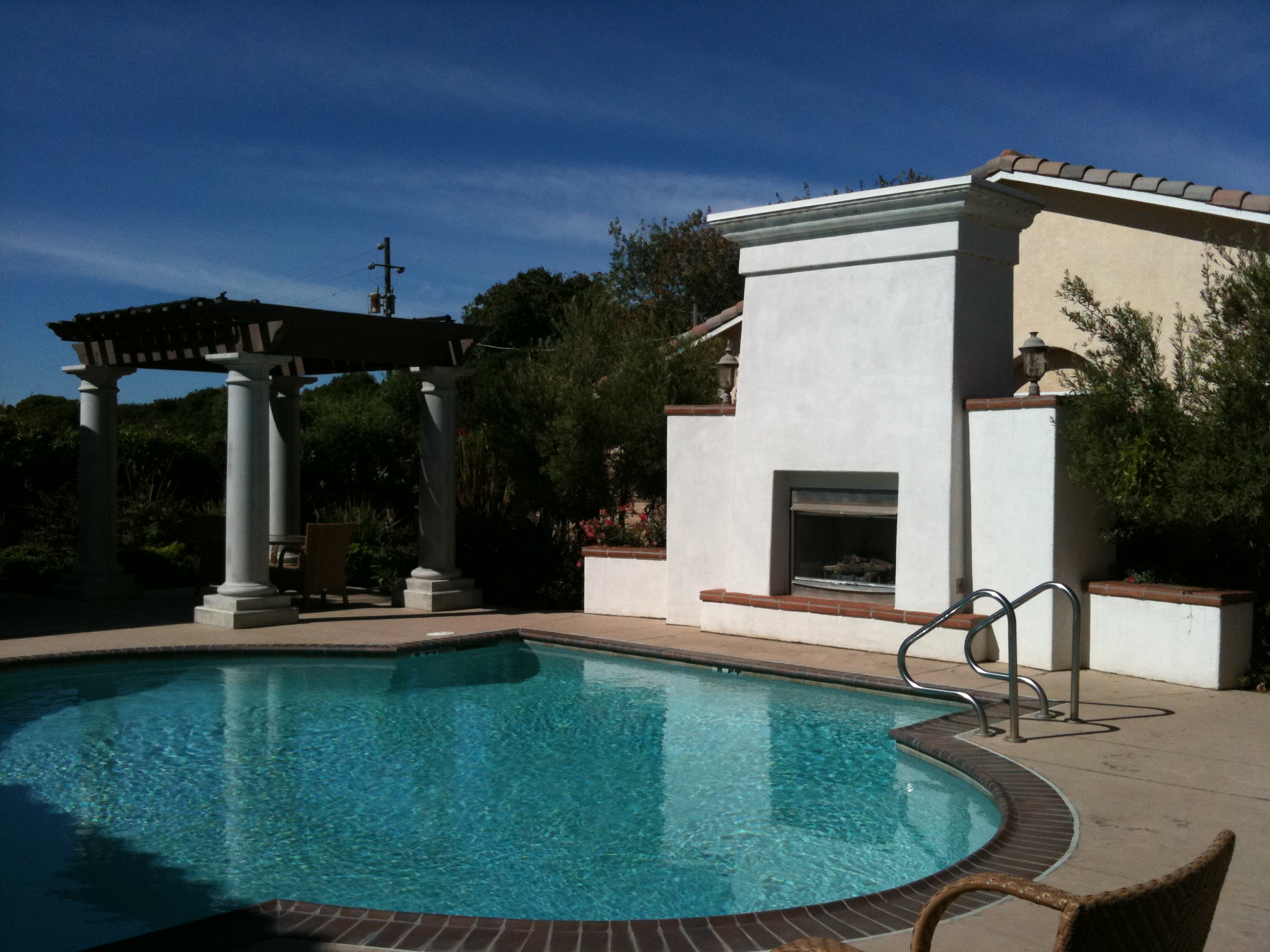 Outdoor Pool And Fireplace At La Ventana Clubhouse